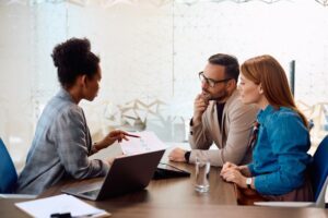 During a consultation, the victim of a collision asks an attorney, “Should I get a lawyer for a car accident that wasn’t my fault?”