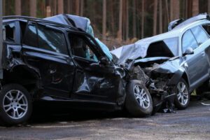 Two cars heavily damaged after an accident. 